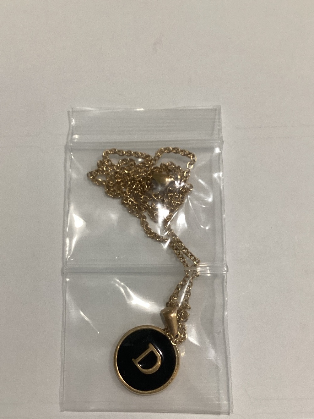 Gold Pendant Necklace with Black Initial 'D'